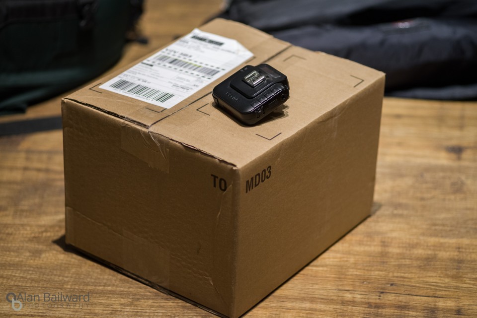 Shipping box with radio trigger on top for scale (box is big, trigger is small)